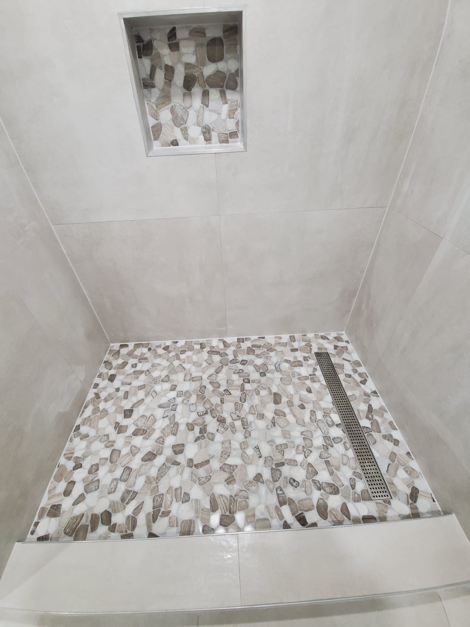 Premium stone and tile bathroom remodeling surfaces